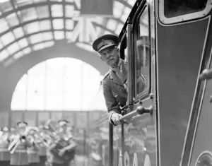 Stock Photography Prints: At Kings Cross, Major General Sir Cecil Pereira in the cab of Coldstreamer