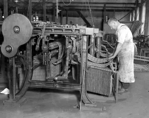 Lace making at messrs William Bridgett and Sons Ltd, Lenton, Nottingham. Fixing