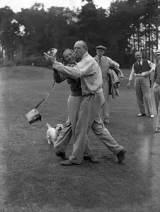 Celebration Prints: Ladies v Men at the New Zealand Golf Club, Byfleet. Mr G Hawkins and Miss Diana Fishwick
