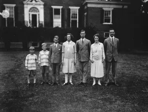 Lady Astor at her ancestral home. Lord and Lady Astor with their children, reunited