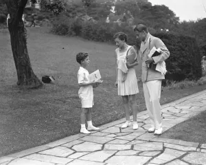 Tennis Prints: Lady Crosfields tennis party at Highgate. Master Paul Homes Cronefield with Mr