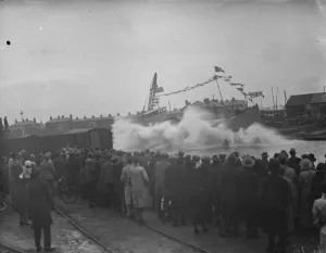 Spectator Prints: Large waves as a ship is launched broadside down the slipway at Faversham, Kent