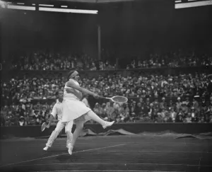 Lawn tennis at Wimbledon. Miss Betty Nuthall in play. 27 June 1929