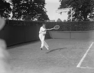 Lawn tennis at Wimbledon. Wilbur Coen ( USA ) in play against Axel Petersen ( Denmark )