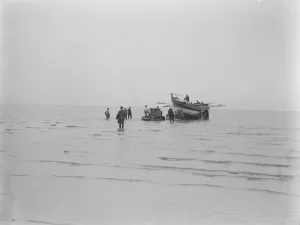 Lifeboat launched by Motor Tractor. Horses replaced by water tight machinery An