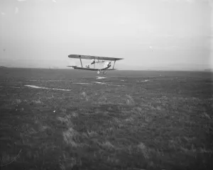 Light aeroplane trials at Lympne Cygnet 11 Biplane taking off in the high speed