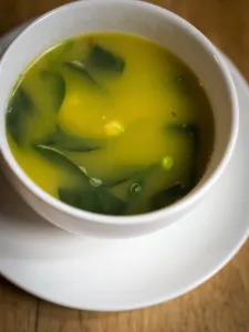 Light Prints: Light fresh soup made of lobster stock with saffron, prawns, peas and baby spinach