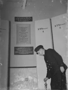 Lighthouse Prints: Lighthouse keeper at Dungeness lighthouse in Kent, checks the oil tanks