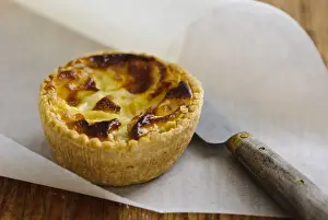 Knife Prints: Little Quiche Lorraine on curled greaseproof paper with knife credit: Marie-Louise