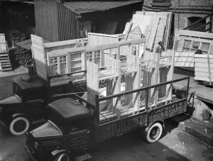 Timber Prints: Loading Bedford lorrys at the G Ellis joinery works in Hackney. 7 April 1938