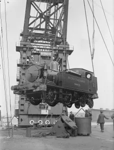 Loading two railways engines by the 150 ton floating crane for the Isle of Wight holiday rush