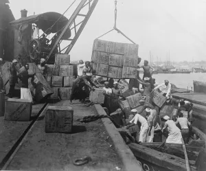 Loading tea into lighters. Ceylon. 23 March 1923
