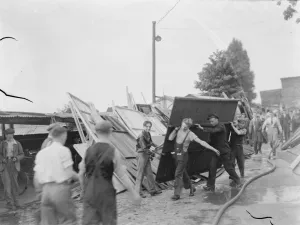 Locals help with the clear up following the timber yard fire in Bexleyheath, Kent