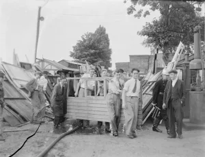 Locals help with the clear up following the timber yard fire in Bexleyheath, Kent