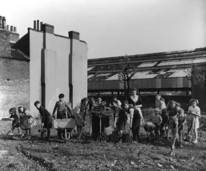 Working Prints: London. Bermondsey brightens up her bomb sites. 1950 Humming Bees Club gets to work