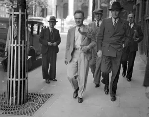 Suits Prints: London Bus Strike Sequel. A. F. Papworth (tie flying) and Bill Ware arriving at transport