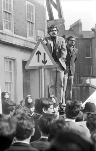 London: Pakistani-born student leader Tariq Ali stands a top pillar-box near