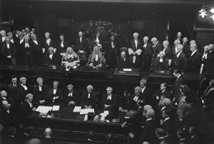 Lord Birkenhead, the Lord Chancellor, making his speech. Next to him is the Lord Chief Justice