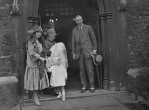 Lord and Lady Gorell after the christening of their infant son at Christ Church, Kensington