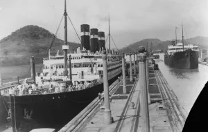Lowering a liner after a worlds tour. The SS Belgenland, after completing its