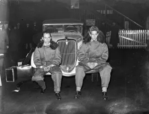 Lt Joels Thorne, driver and Mr Jogn V Oliveau ( left ) mechanic with car to enter