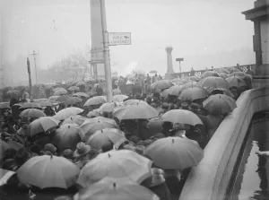 The Lying in State of King George V at Westminster Umbrellas in the queue, that