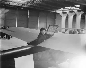 Lympne light aeroplane trials Mr M W Piercey about to close the wing after taking
