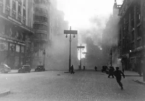 Battle Prints: Madrid again under fire. Shell that killed three, injured 15. British women MPs in danger