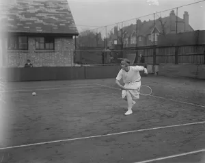 Magdalen Park lawn tennis tournament. Miss Joan Fry in play in the ladies singles