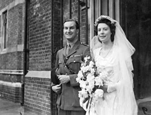 Flowers Collection: Maj James G Gilbertson, M. C. Royal Artillery and Miss Diana M. Adams leaving holy Trinity Church