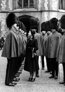 Royal Prints: Her Majesty Queen Elizabeth II pauses to talk to one of the Grenadier Guards as she