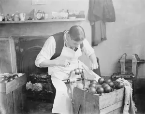The making of cricket balls at London football company station road, South Norwood Seaming