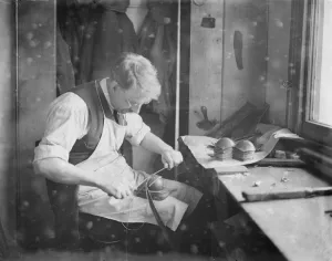 The making of cricket balls at London football company station road, South Norwood Closing