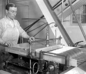 Making Ice bricks at Cady Hall. Cutting the ice into blocks by a series of circular saws
