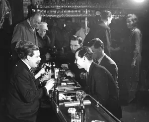 Playing Prints: Male customers take advantage of the new gaming and betting act which makes it legal to play cards