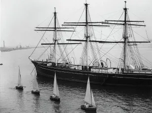 Sails Prints: Two man sailing boats sail passed The Cutty Sark on the River Thames off Greenhithe, Kent