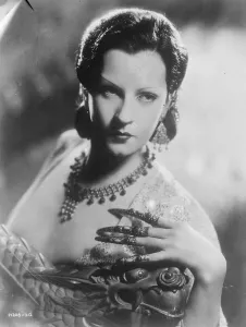 Mandarin finger tips the latest fashion stunt. Juliette Compton, the famous film star
