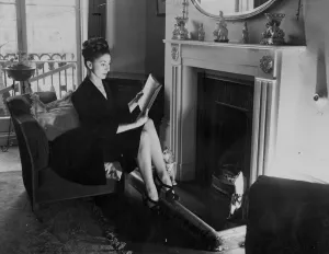Home Prints: Margot Fonteyn at home. A quiet read by the fireside before leaving for the Royal Opera House