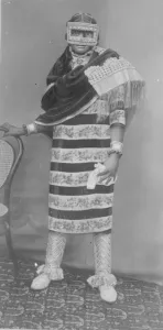 Masked Beauty A lady of the Arab town in Zanzibar wearing the Barakoa a mask reaching