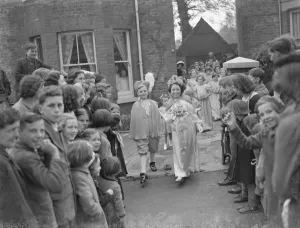 Costumes Prints: May Day festivities. Miss Patrcia Parker the Sidcup May Queen leading her retinue