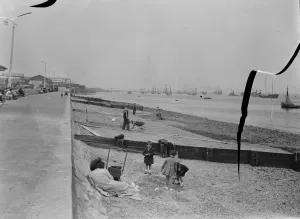 Members of the public relax on the opened beaches of the river Thames in Gravesend