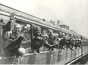 Waving Collection: Men of the British Expeditionary Force returning from the Flanders evacuation, give