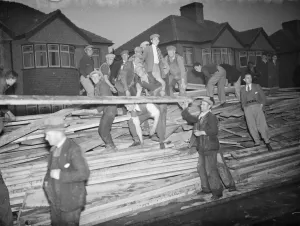 Wood Prints: Men rescuing timber from the fire at the timber yard in Welling in Kent