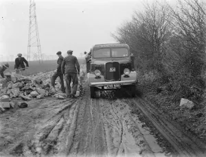 Muddy Prints: Men working on the construction of the Dartford Tunnel in Kent. 1937