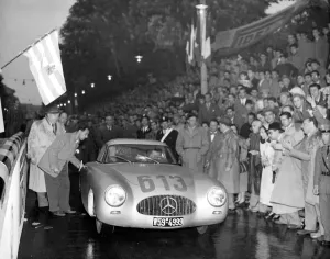 Sports Car Sportscar Sports Car Prints: The Mercedes car of German pair Rudolph Caracciola and co-driver Kurrle prepares to leave Brescia