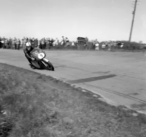 Mettet, Belgium : Britains famous John Surtees riding his MV Augusta at the Internation