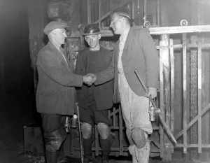 Protective Clothing Prints: Miners shaking hands A TopFoto