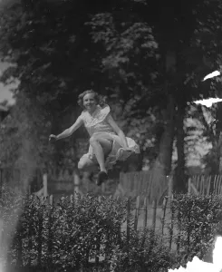 Fence Prints: Miss D Topham jumping. 1935