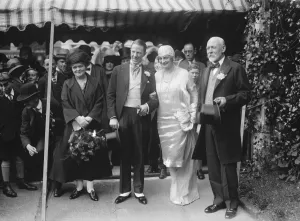 Miss E Scotney was married at St Clement Danes to Mr D H Russell. Bride and Bridegroom