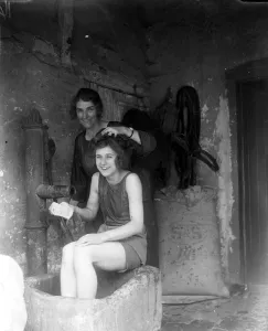Miss Edna Maude, seventeen year old dancer on holiday in Somerset. Having a wash